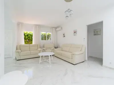 Zona de estar de FaroQuilla Suites Pasito Blanco