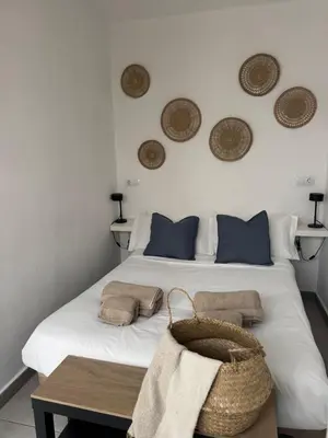 Cama o camas de una habitación en City Beach 1