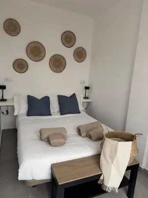 Cama o camas de una habitación en City Beach 1