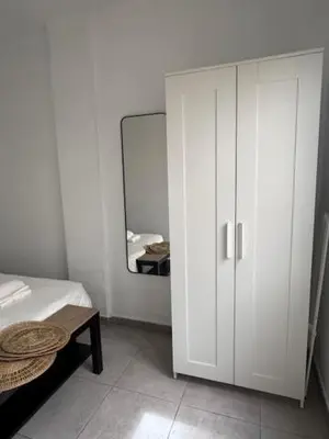 Cama o camas de una habitación en City Beach 1