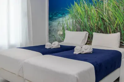 Cama o camas de una habitación en Bright Flat - Beachfront Las Canteras