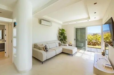 Una televisión o centro de entretenimiento en Vista Golf Salobre Golf