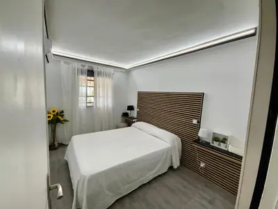 Cama o camas de una habitación en Bungalow Vista Dorada