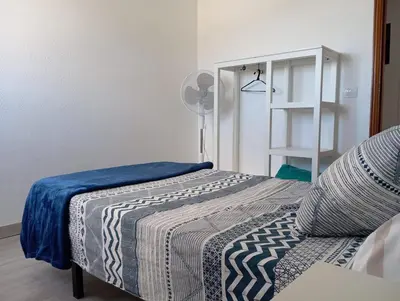 Cama o camas de una habitación en La Casita de Cheny