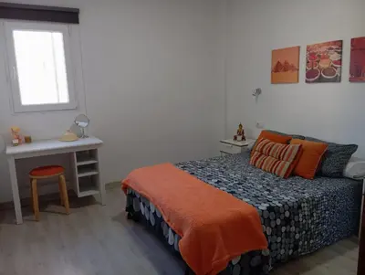 Cama o camas de una habitación en La Casita de Cheny