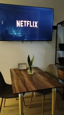Una televisión o centro de entretenimiento en Las Canteras Beach Balcony