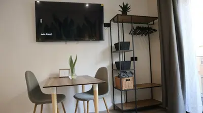 Una televisión o centro de entretenimiento en Las Canteras Beach Balcony