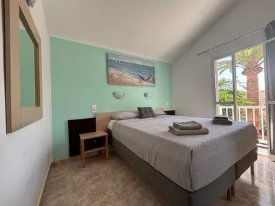 Cama o camas de una habitación en Blu Green Oasis 1214 By Lucapropertiesgrancanaria