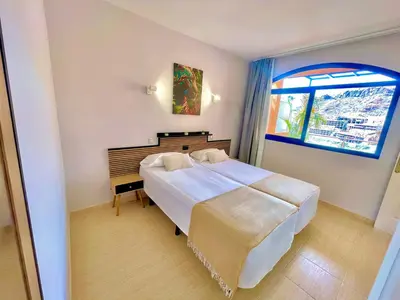 Cama o camas de una habitación en Paradise Taurito Dreams