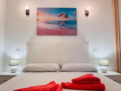Cama o camas de una habitación en Santa Barbara Tropical by Alquiler de Sueno - 2 private terraces