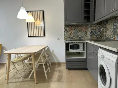Una cocina o zona de cocina en Apartamento elegante y tranquilo con encanto