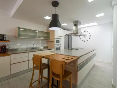 Una cocina o zona de cocina en Sunnyland Villa