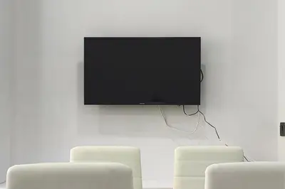 Una televisión o centro de entretenimiento en Fontanales Beach Flat