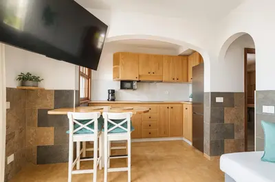 Una cocina o zona de cocina en Bungalow Golf Splash Park