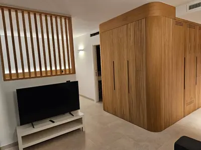 Una televisión o centro de entretenimiento en Fahana Residences Arguineguín