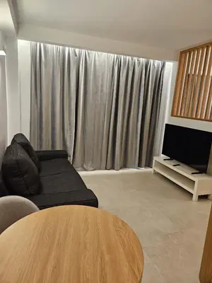 Una televisión o centro de entretenimiento en Fahana Residences Arguineguín