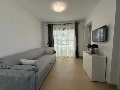 Una televisión o centro de entretenimiento en Oceanica home