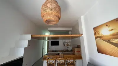 Una cocina o zona de cocina en la casa de pozo1
