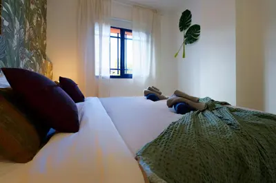 Cama o camas de una habitación en Meloneras beach detached house with BBQ and garden