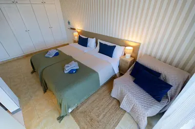 Cama o camas de una habitación en Meloneras beach detached house with BBQ and garden
