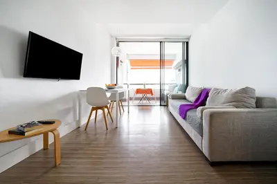Una televisión o centro de entretenimiento en Estudio con terraza vista mar II
