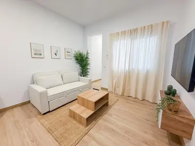 Una televisión o centro de entretenimiento en City Beach Las Canteras