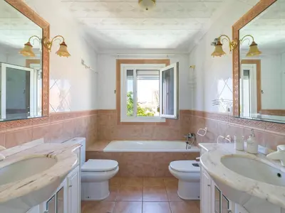 Un baño de Villa Casa Rosanna