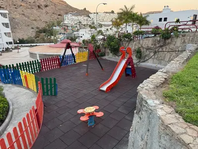 Zona de juegos infantil en Apartamento Victoria