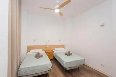 Cama o camas de una habitación en GuestReady - Rosamar Apartments