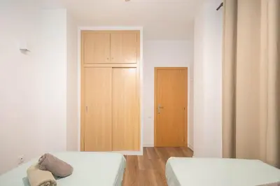 Cama o camas de una habitación en GuestReady - Rosamar Apartments
