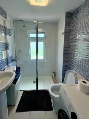 Un baño de Iguazu 2 bedroom apartment