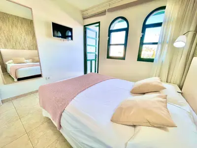 Cama o camas de una habitación en Paradise Dreams