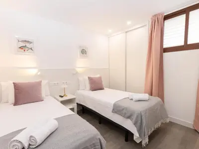 Cama o camas de una habitación en Secrets of Atlantic Holiday Home