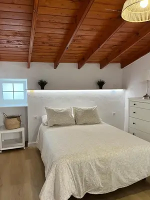 Cama o camas de una habitación en Moya senderos, naturaleza y mar 2