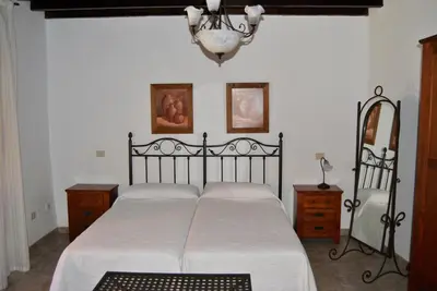 Cama o camas de una habitación en Casa Rural Los Suárez