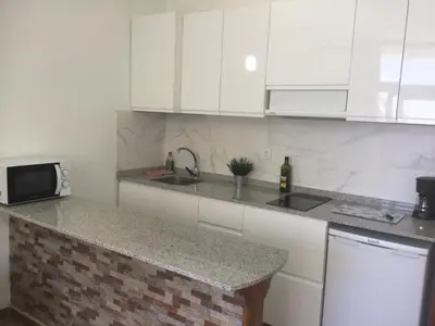 Una cocina o zona de cocina en Las Dunas - Playa del Ingles