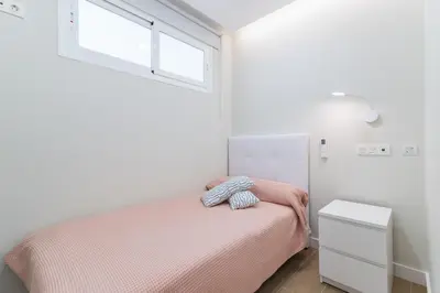 Cama o camas de una habitación en M&M SUITE AGAETE PARQUE by HOMESTAYGRANCANARIA