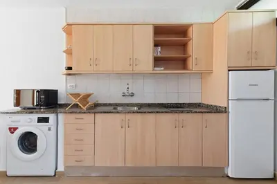 Una cocina o zona de cocina en SUNSET BAY 208 by HOMESTAYGRANCANARIA