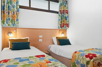 Cama o camas de una habitación en SUNSET BAY 208 by HOMESTAYGRANCANARIA