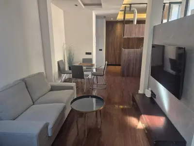 Una televisión o centro de entretenimiento en Canteras Aqua Essence - Private Pool & Beach