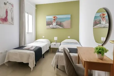 Cama o camas de una habitación en Vegueta Canary Suite