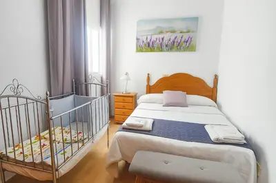 Cama o camas de una habitación en Moya Canary Away & parking