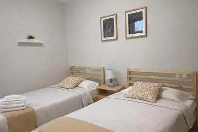Cama o camas de una habitación en Vegueta Cool Suites