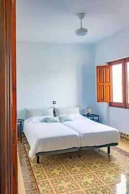 Cama o camas de una habitación en La Centenaria 1920
