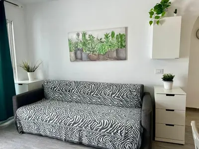 Cama o camas de una habitación en playa del cura apartment with terrace