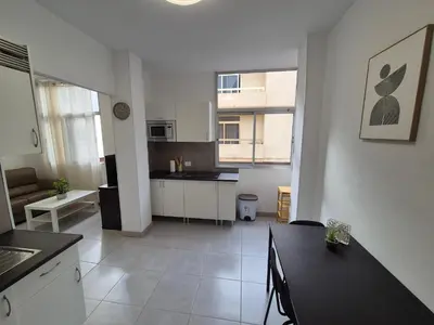 Una cocina o zona de cocina en Beach Home - Las Canteras