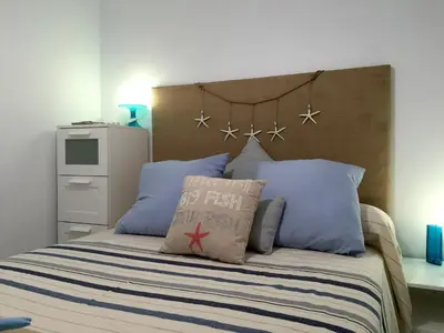 Cama o camas de una habitación en Mai Apartment