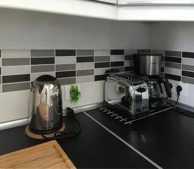 Una cocina o zona de cocina en Mai Apartment