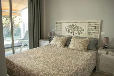 Cama o camas de una habitación en Mogán Perla