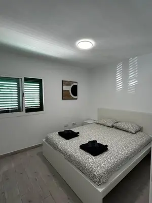 Cama o camas de una habitación en Beach life only 5 minutes away and Heated pool